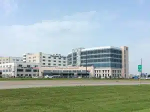 DGH-Tower-2-1024×765 landscape view of large hospital building with glass curtainwall