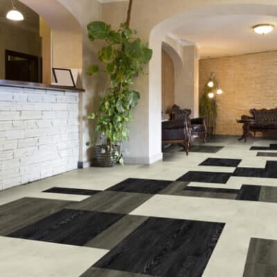 hotel lobby with elegant decor and black and white commercial flooring