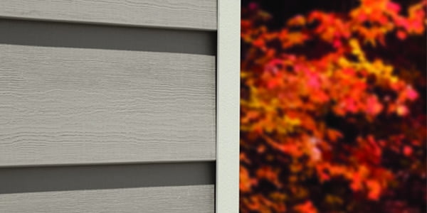 advanced-composite-siding close up photo of gray advanced composite siding